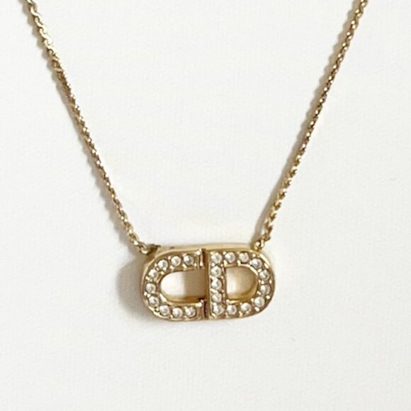 Dior Jewelry - DIOR Vintage Gold Tone Diamante Logo Pendant Necklace